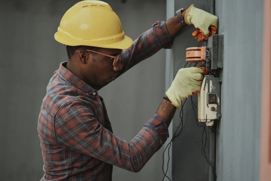 Technician repairing an outdoor AC condenser